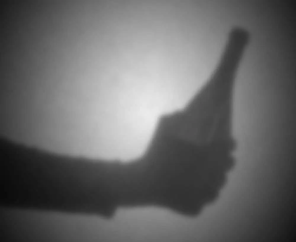 Silhouette,Behind,A,Transparent,Paper,-,Blurred,-,Bottle,Of