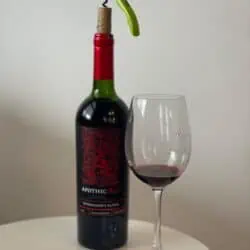 bottle of apothic red blend with wine glass